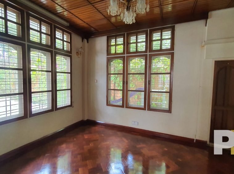 room with hanging light - properties in Yangon