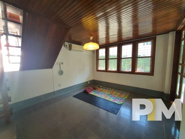 room with hanging light - properties in Yangon