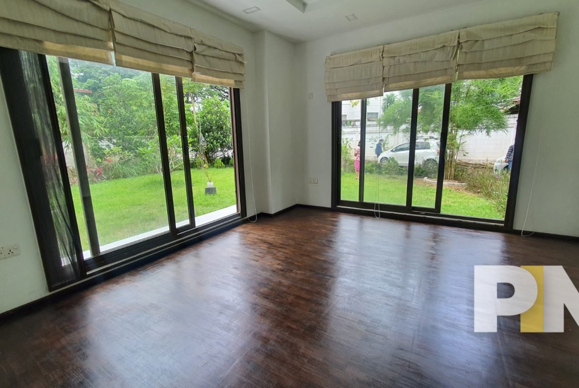 room with large glass door - Yangon Real Estate