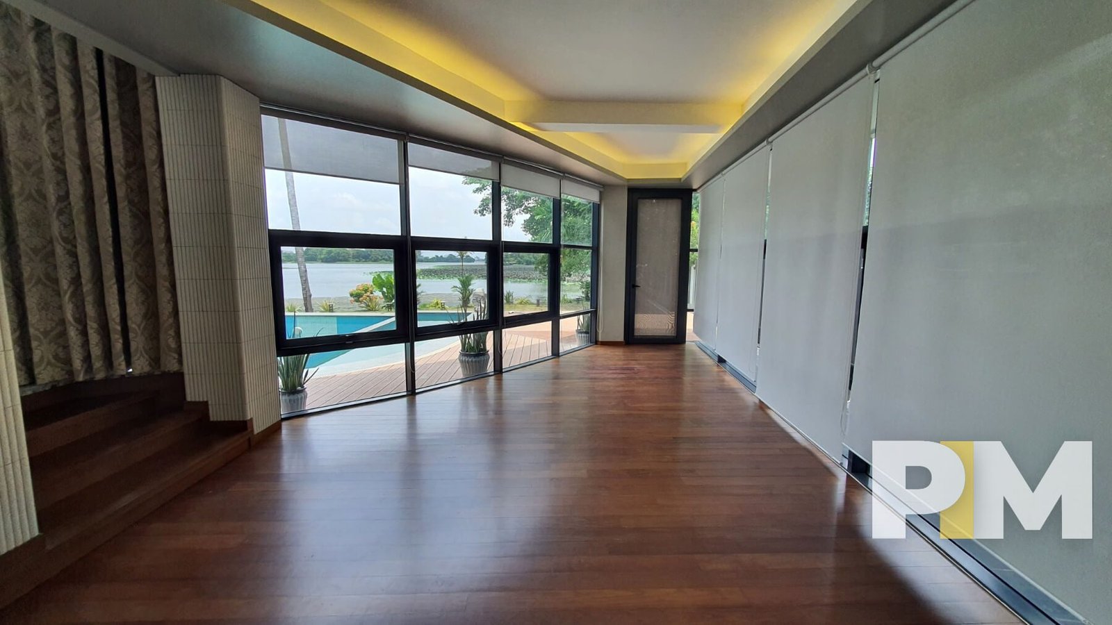 room with large glass window - Yangon Property