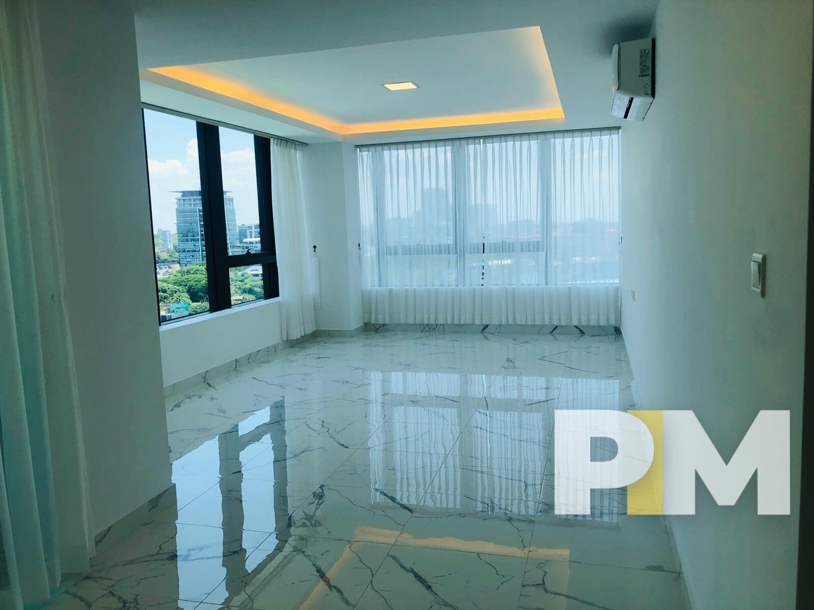 room with large glass window - Yangon Real Estate