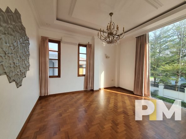 room with large glass window - properties in Yangon