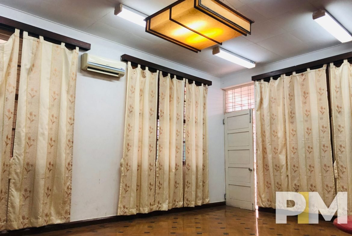 room with long curtains - property in Yangon