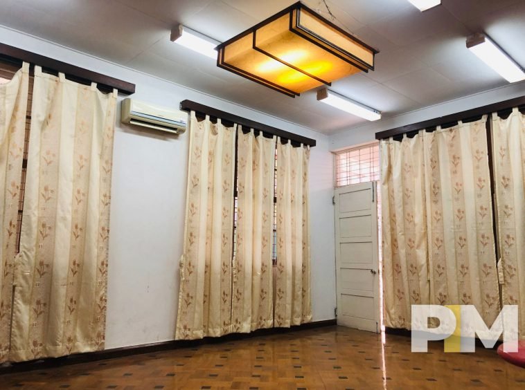 room with long curtains - property in Yangon