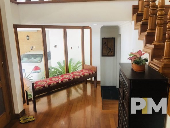 room with long sofa seat - Yangon Property