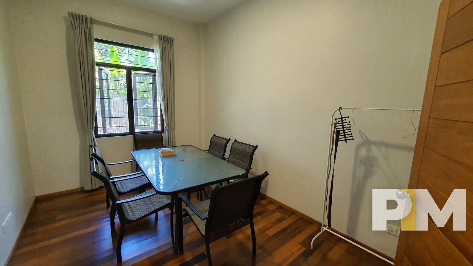 room with table and chairs - Rent in Yangon