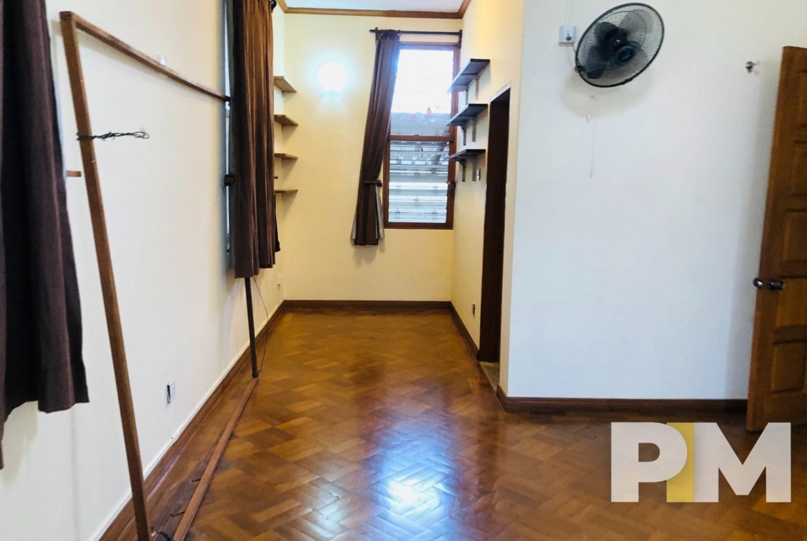 room with wall fan - properties in Yangon