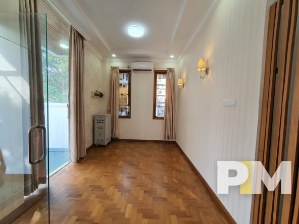 room with wall light - property in Yangon