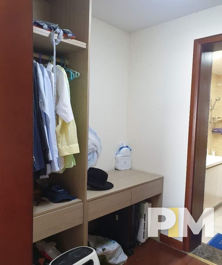 room with clothing hanger - Home Rental Myanmar