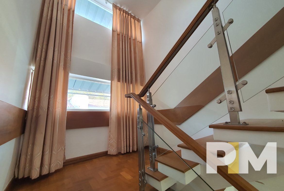 staircase with curtains - properties in Yangon
