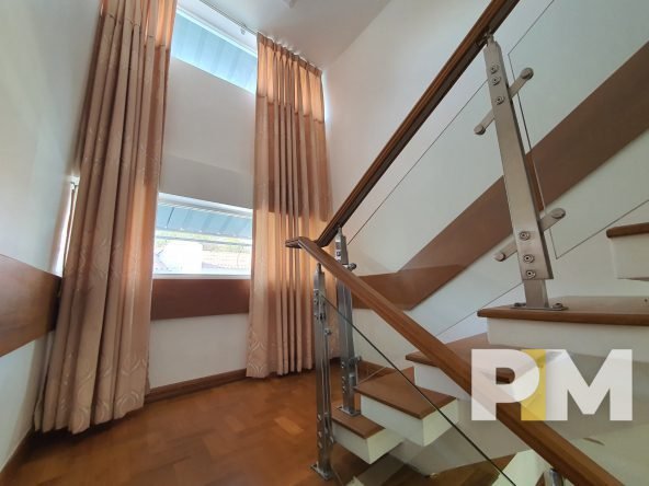 staircase with curtains - properties in Yangon