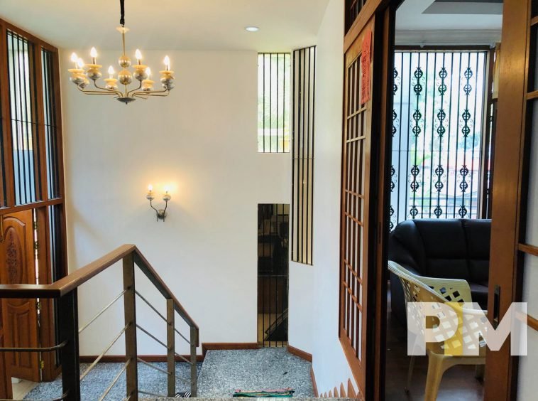 staircase with hanging light - Home Rental Yangon