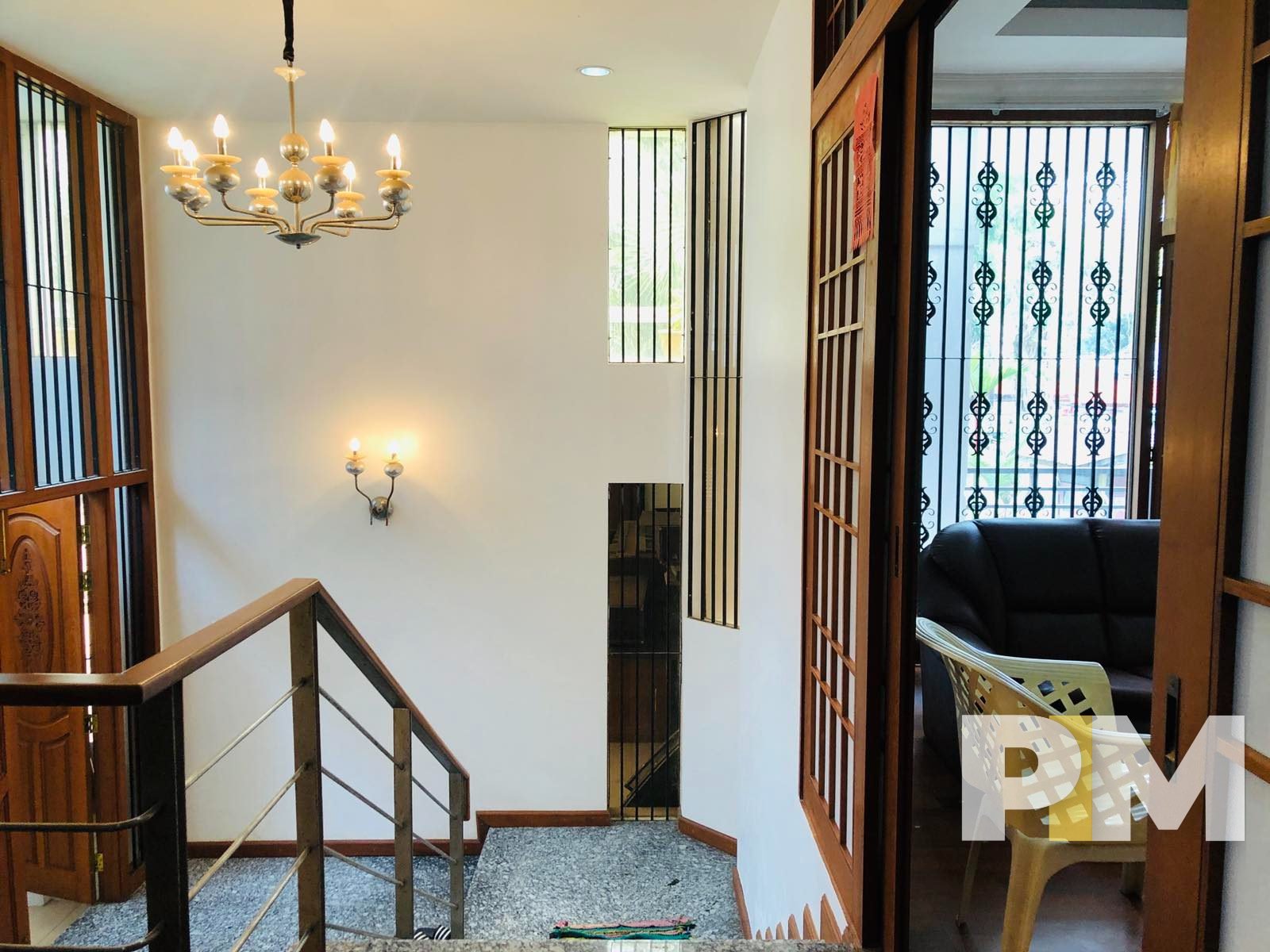 staircase with hanging light - Home Rental Yangon