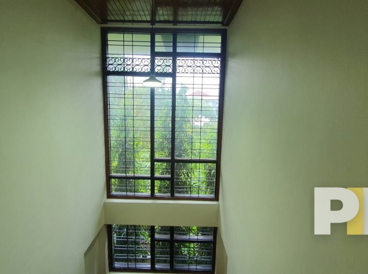 staircase with hanging light - Yangon Property