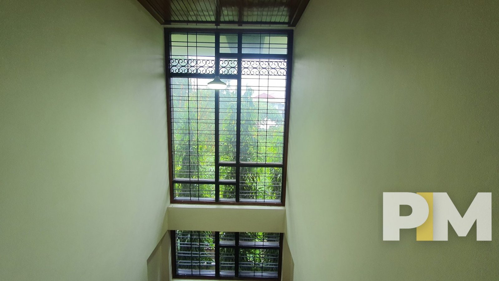 staircase with hanging light - Yangon Property