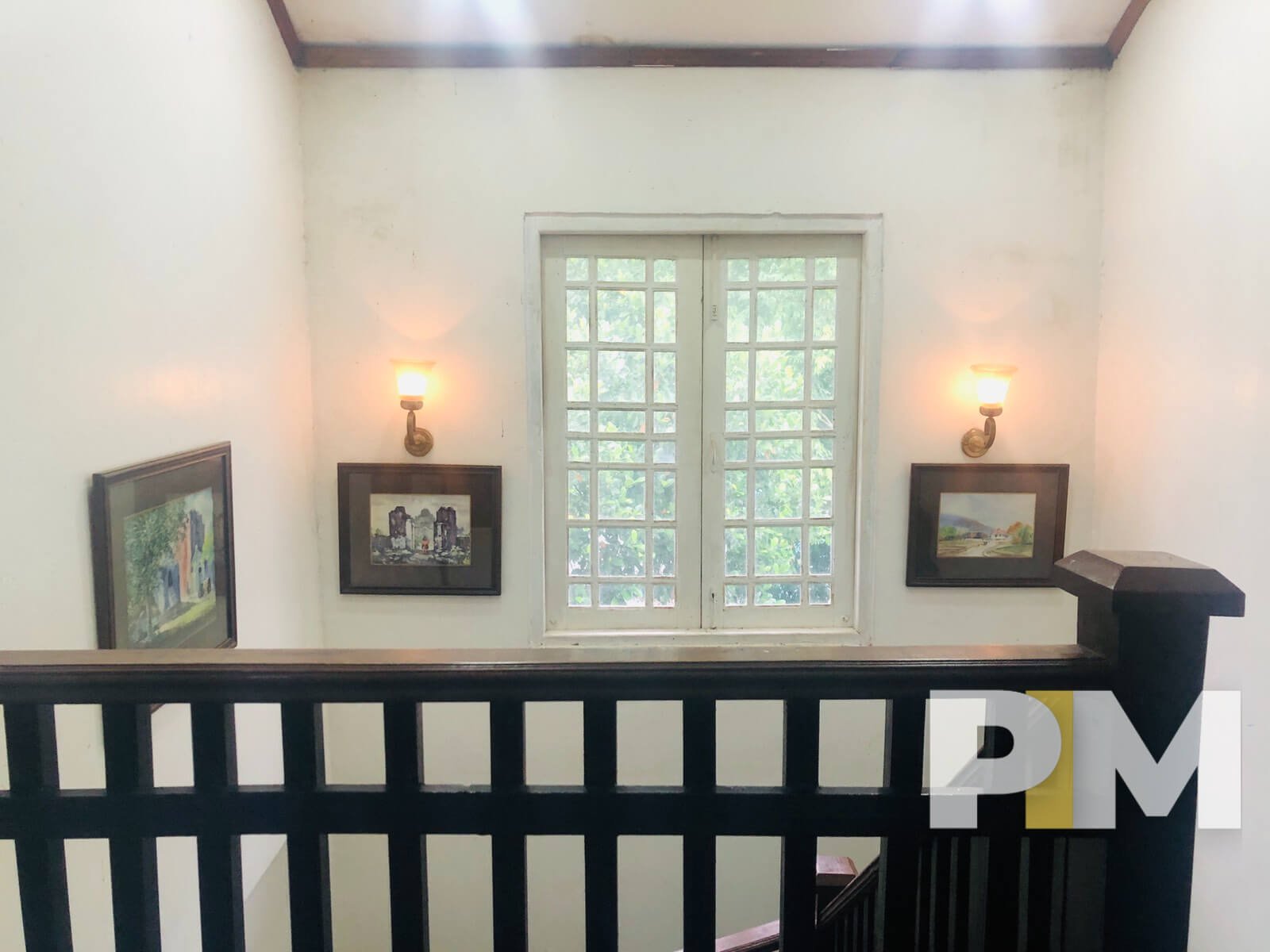 staircase with wall lights - House for rent in Mayangone