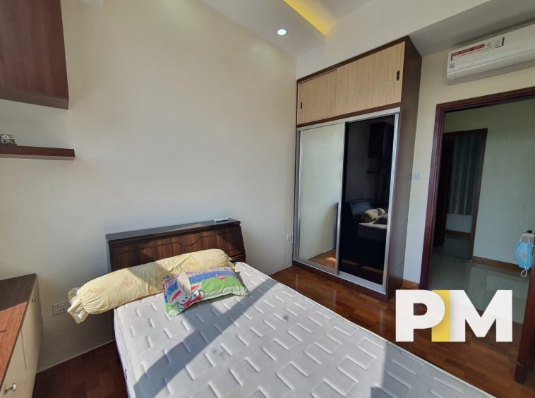 Bed room with natural light - Property in Yangon