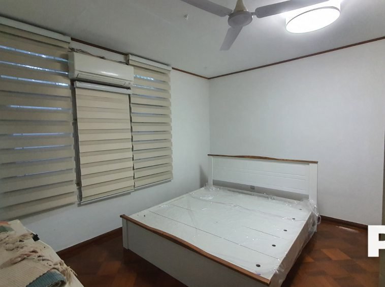 Bedroom with bed and air-conditioner-Myanmar Real Estate