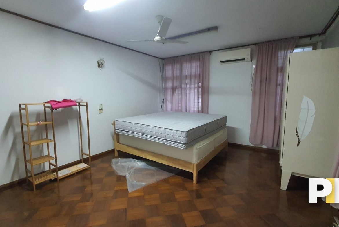 Bedroom with bed and matress-Yan Real Estate