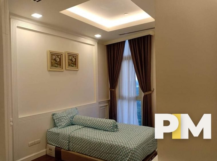 Bedroom with curtains - Real Estate in Yangon