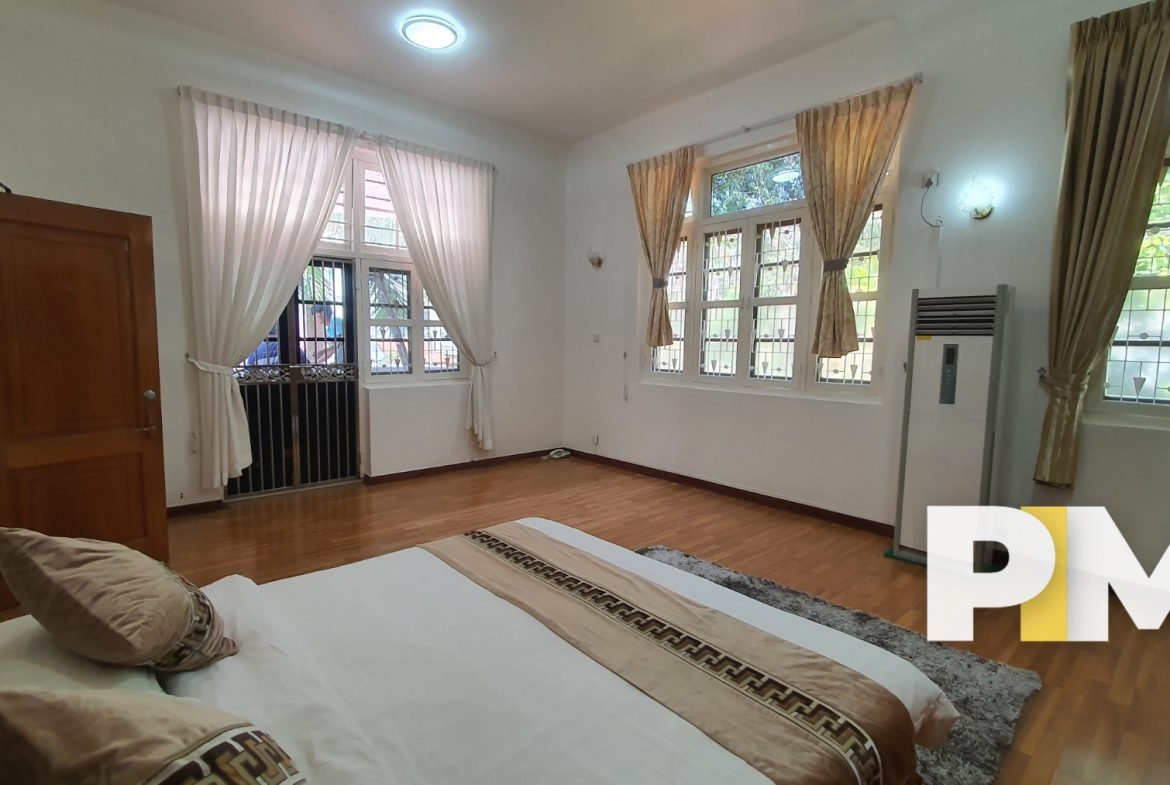 Bedroom with windows - Real Estate in Yangon