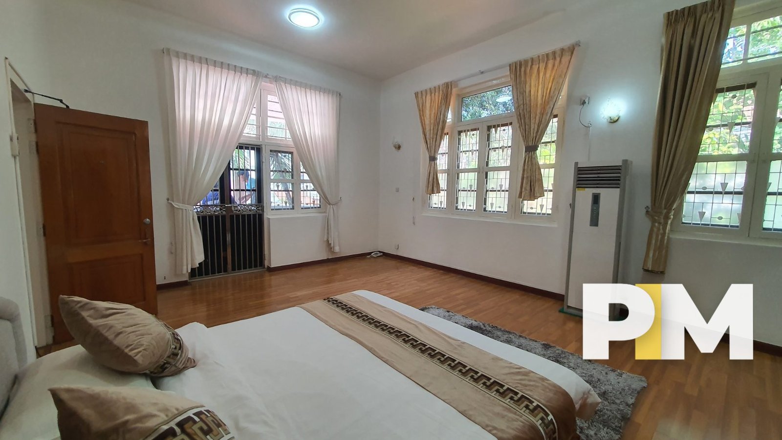 Bedroom with windows - Real Estate in Yangon