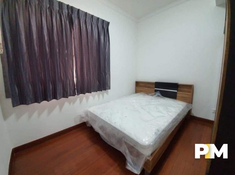 Double bed room with curtain-Property in Yangon