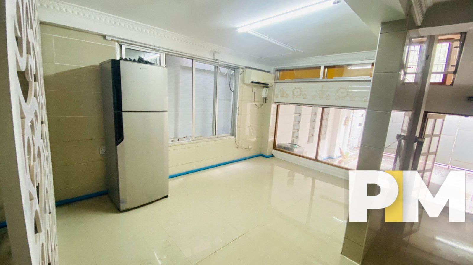 Open space with refrigerator - Real Estate in Yangon