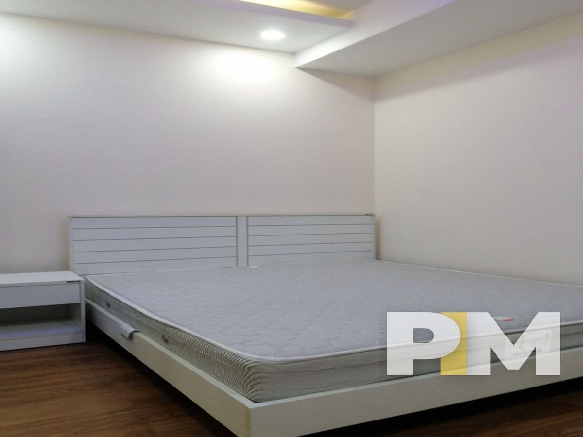 bed and mattress in apartment for rent in myanmar