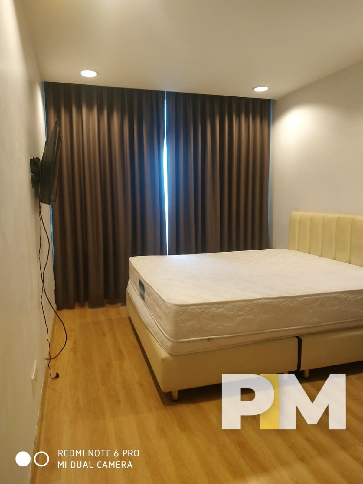Bedroom with TV - Real Estate in Yangon