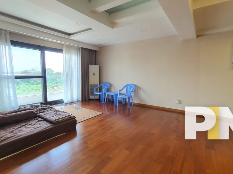 Bedroom with windows - Real Estate in Yangon