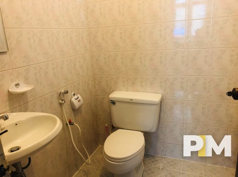 Toilet room with sink - Myanmar Real Estate