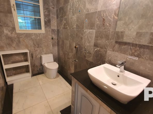 Toilet room with sink - Real Estate in Yangon